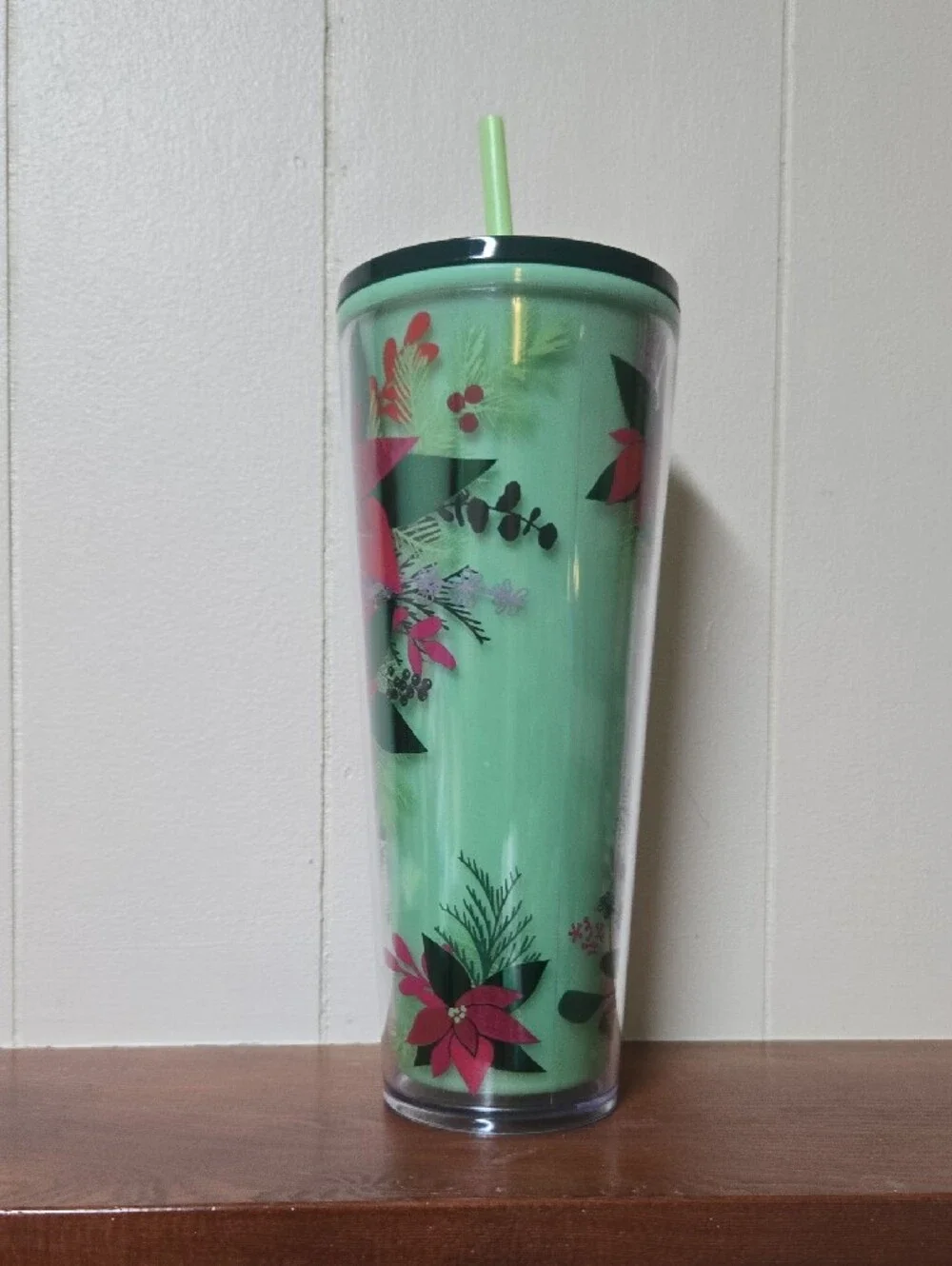 Starbucks Mint Green Tumbler with Pink Floral Design and Dark Green Lid